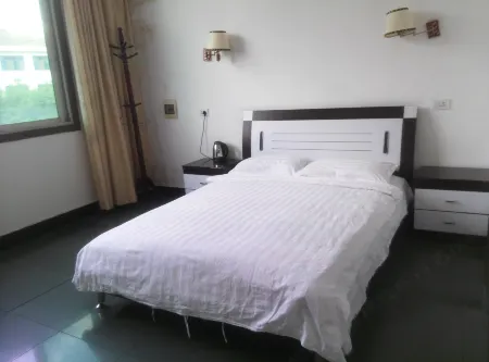 Yuan'an Jialiang Guest House Отели в г. Юаньань