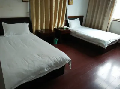 Xinguang Business Hotel Hotel in zona Yinian Pavilion