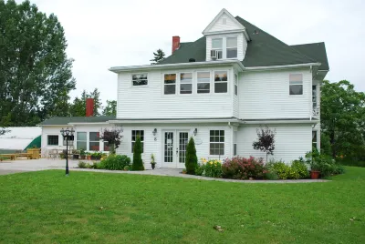 Shamrock Suites فنادق في 