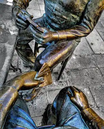 Hotels near Statue of Men Playing Cards