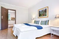 Slottet Apartments Hotels in Odda