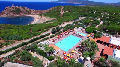 Villaggio Camping Torre Del Porticciolo Hoteles en Alguer